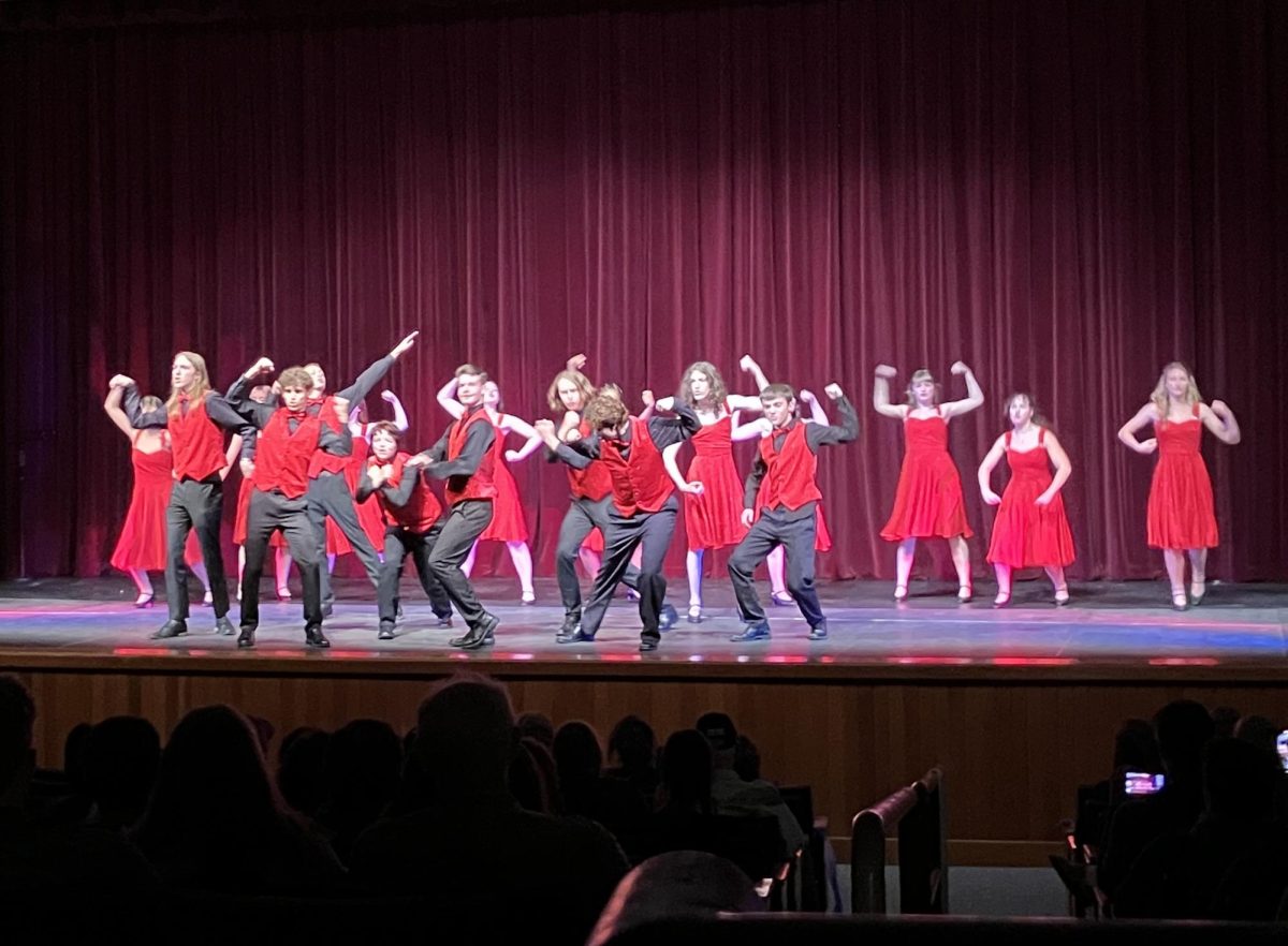 BHS Showstoppers performing to Im Still Standing by Elton John, striking strong poses.