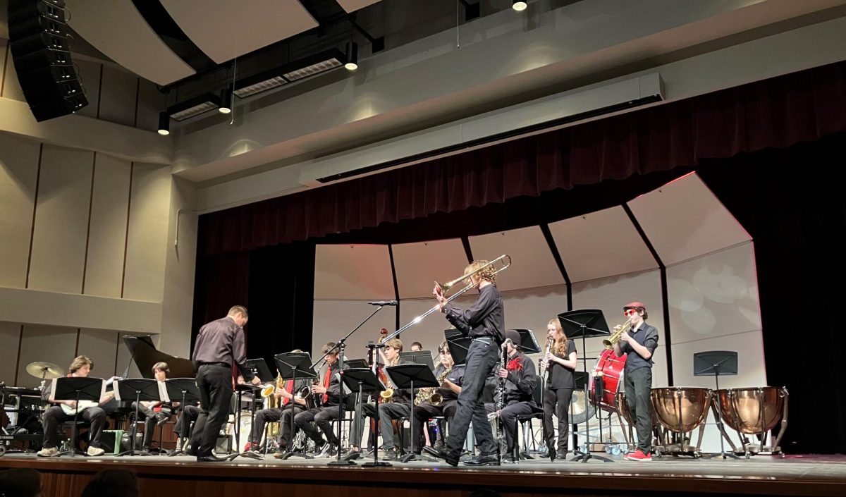 Jazz Band performing Watermelon Man by J.J. Johnson arranged by Mike Tomaro. Micah Flint stands in front, performing a solo.