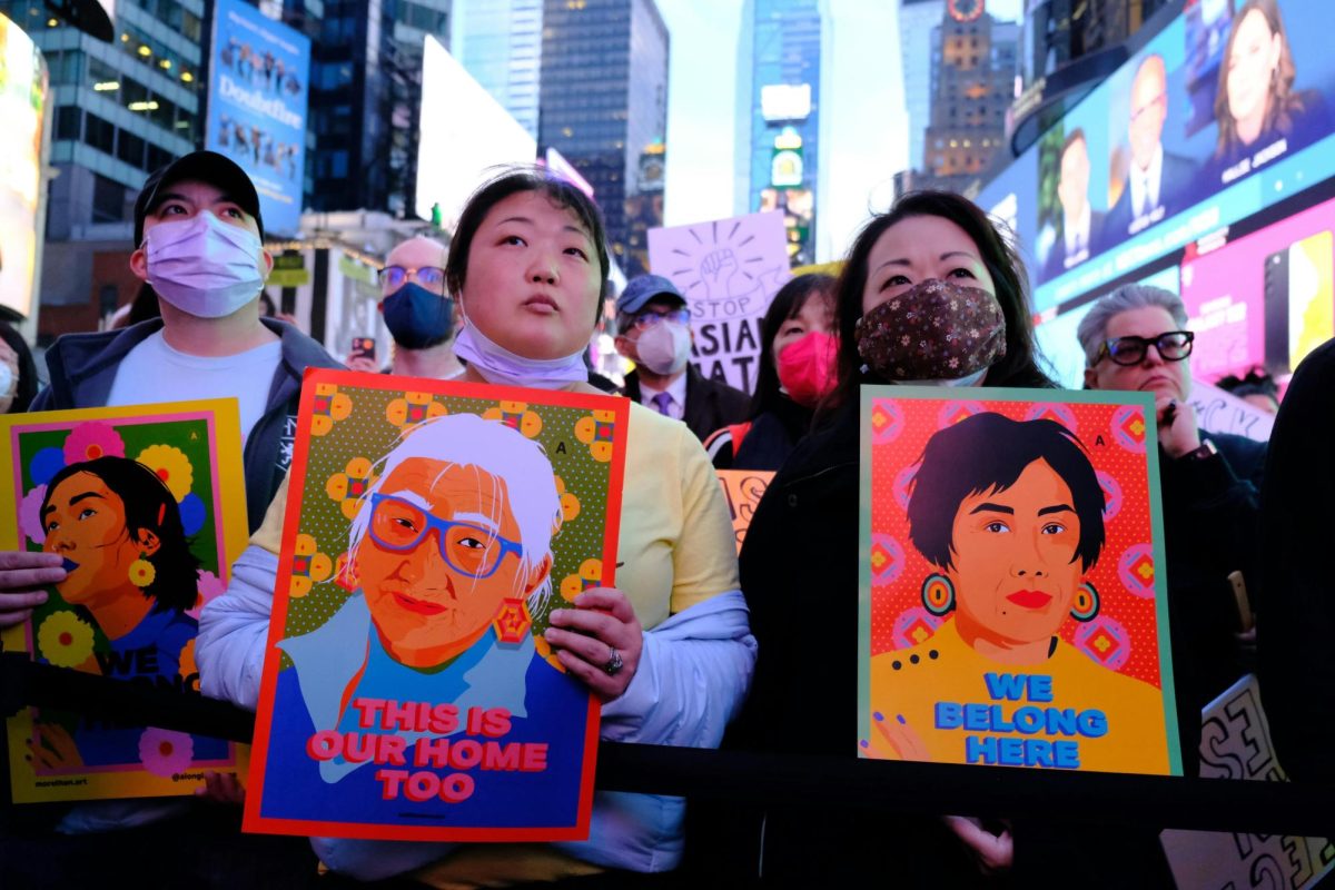 During the COVId-19 pandemic, a Stop Asian Hate rally marches through Times Square in protest of the increased hostility towards those of Asian descent.